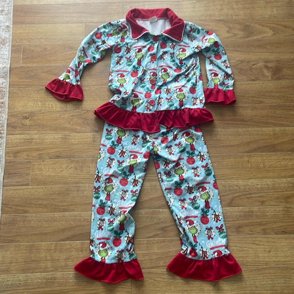 Girls grinch ruffle pajamas.